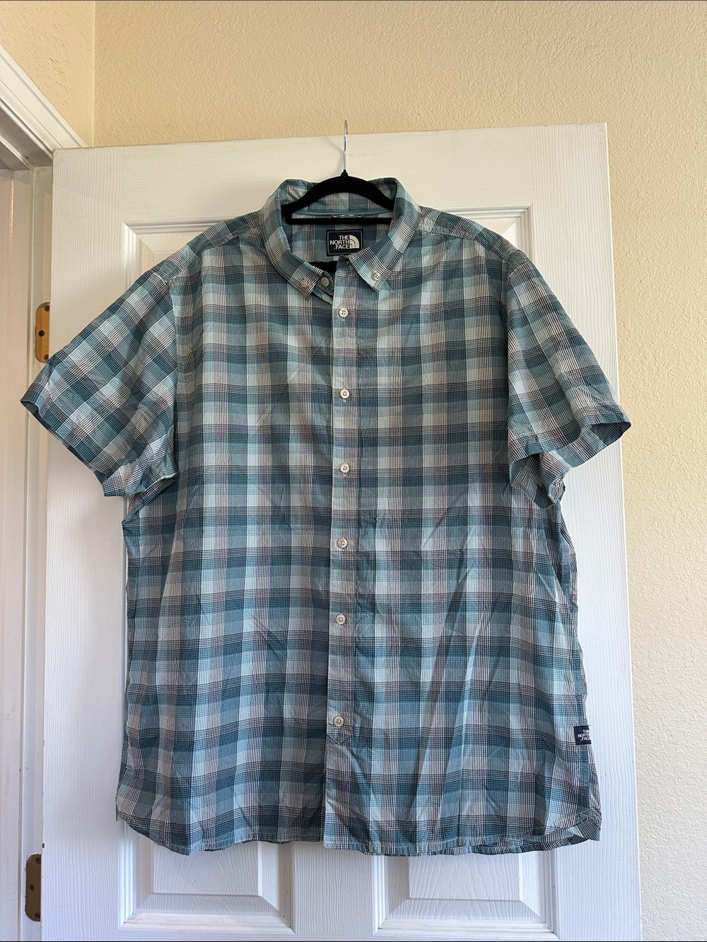 The North Face Men’s Teal and Light Blue Plaid Short Sleeve Button-Down Shirt